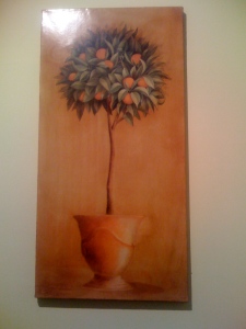 A painting of an orange tree